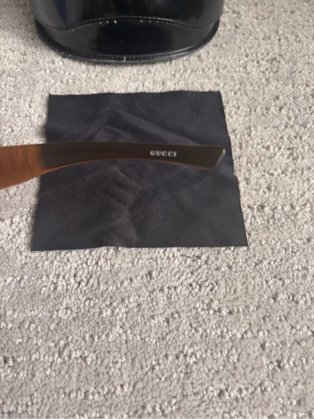 Gucci bold shield